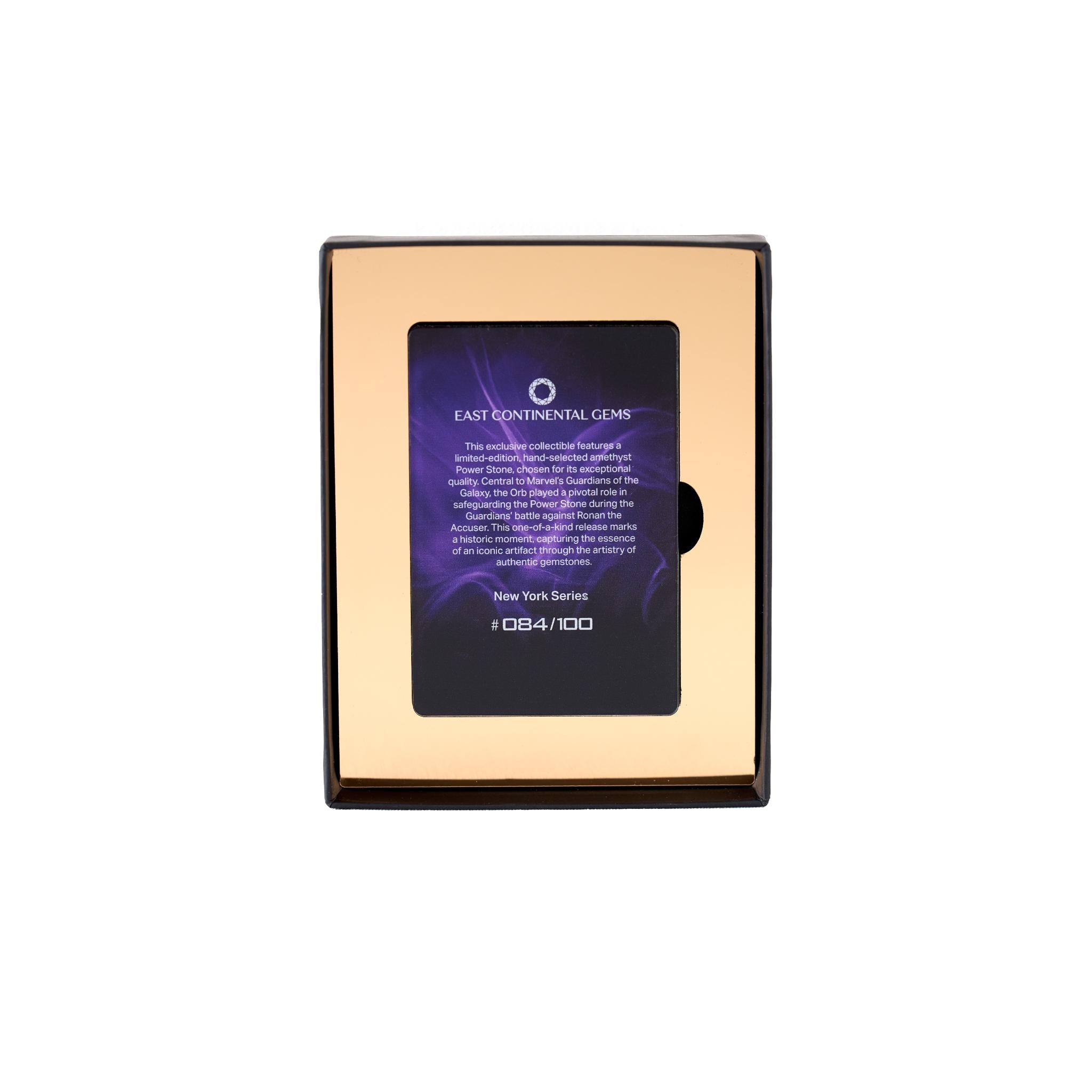 Gold-framed jewelry box with purple interior and text on a white background